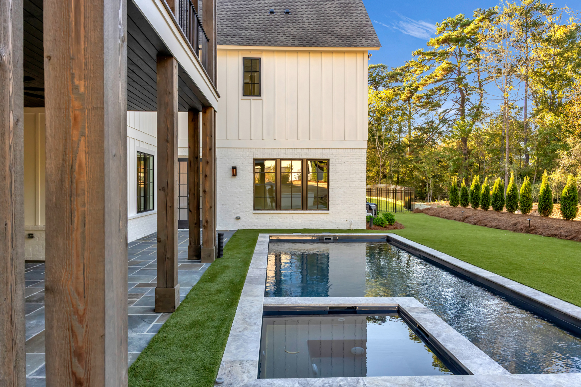 Infinity edge lap pool overlooking water
